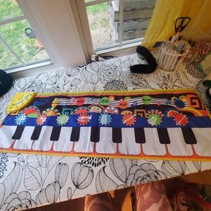 Piano floor mat